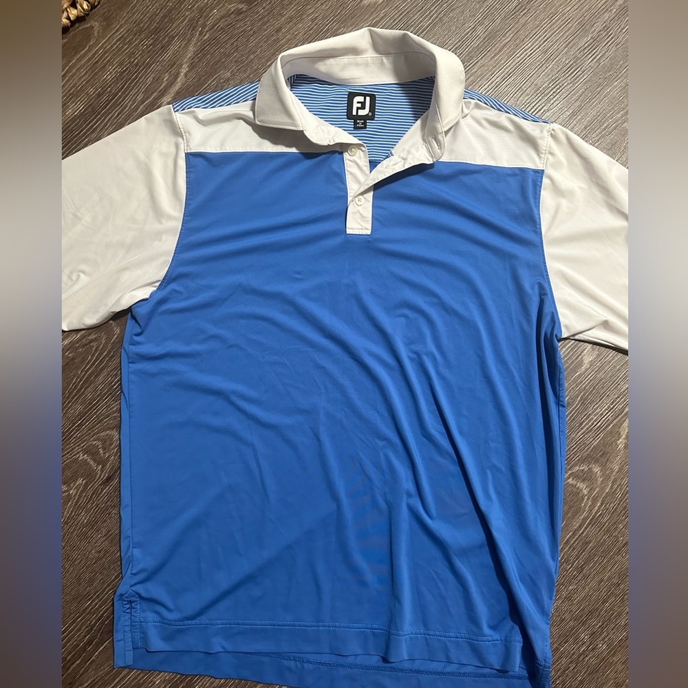 Blue and white footjoy polo